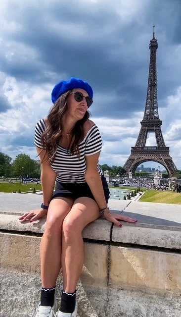Travel content creator near the Eiffel Tower in Paris, France