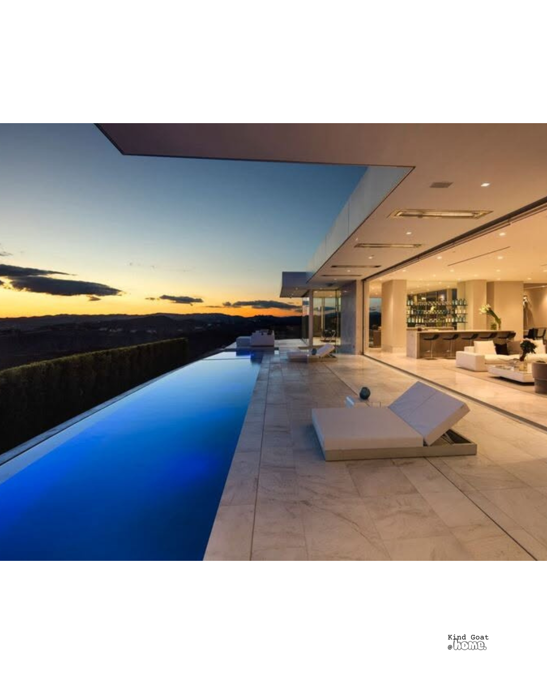 Luxury modern house with an outdoor infinity pool and a scenic sunset view, interior showing a bar and lounge area.