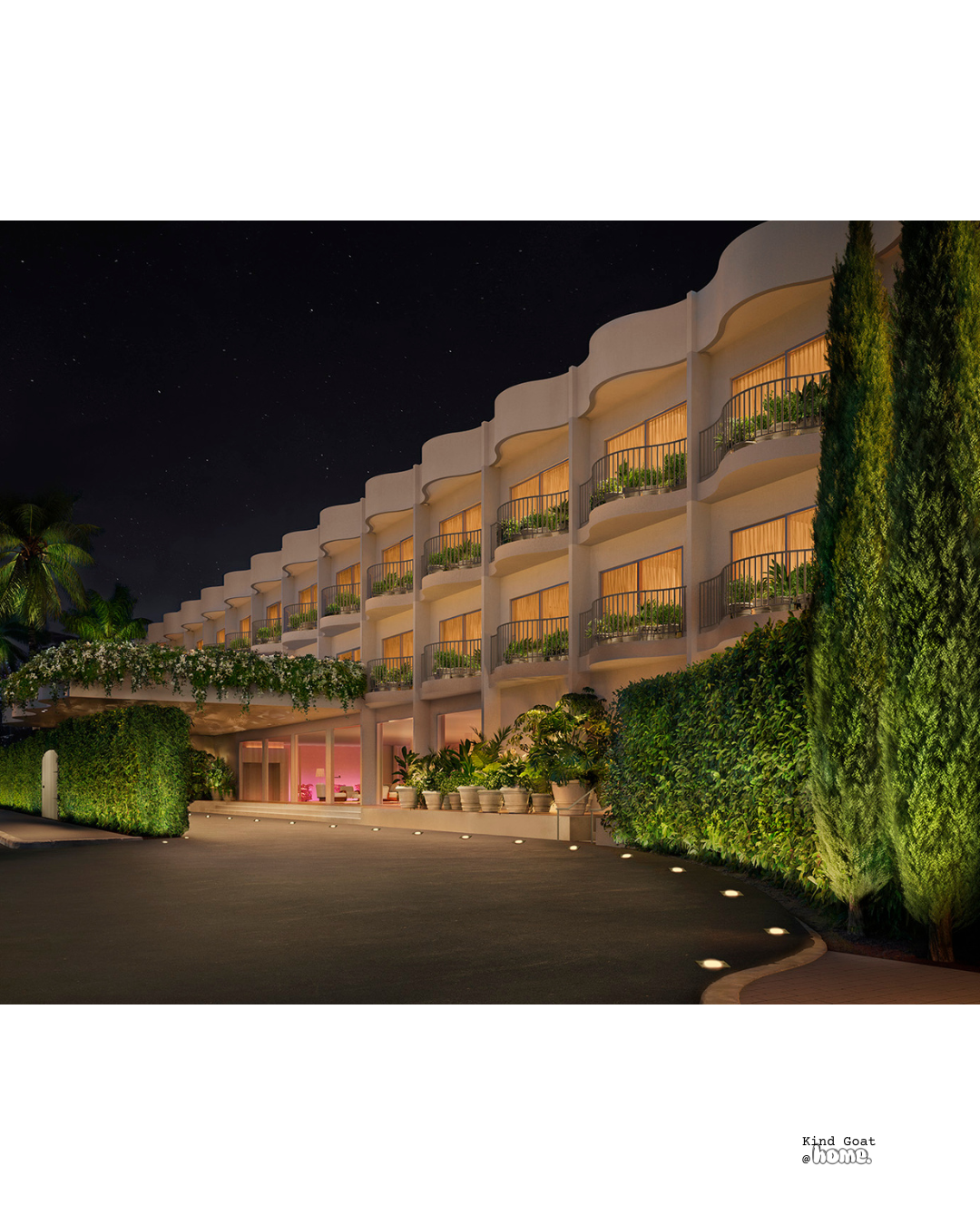 Night view of a modern hotel or resort with multiple balconies, illuminated windows, and lush greenery, including tall trees and potted plants, with a dark starry sky overhead.