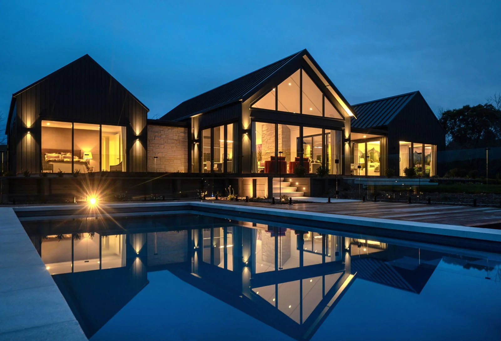 Award winning landmark homes house exterior lit up at night