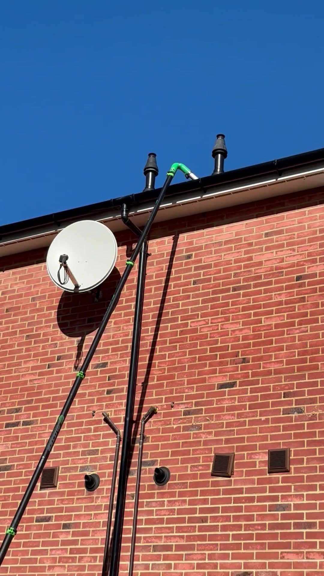 Aylesford-Gutters-4-Hose-In-Gutter.jpg