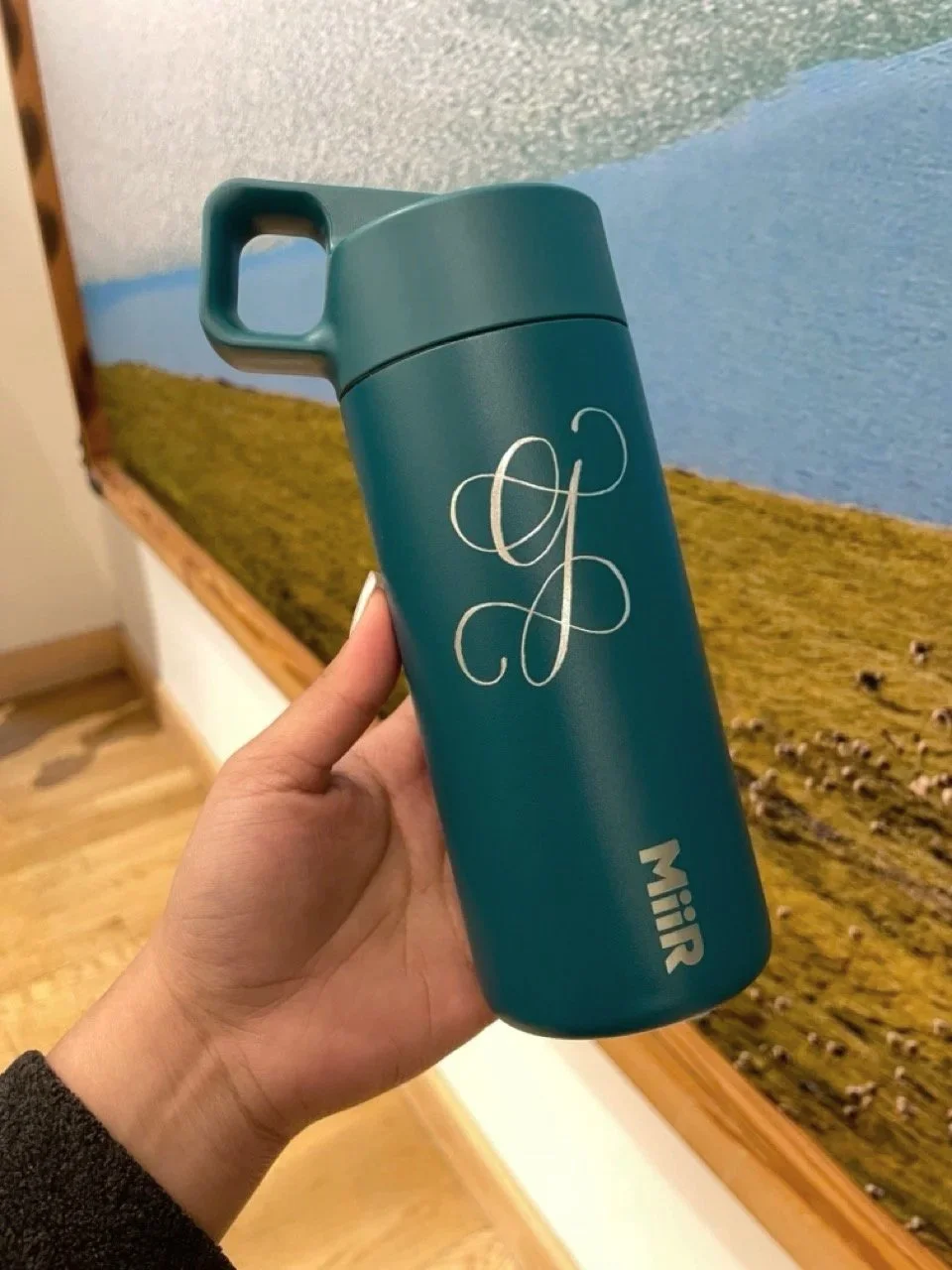 Hand engraved custom initial on a MiiR tumbler for a Patagonia event in NYC