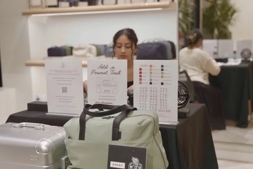 Menu display of a hand monogramming event for Away Travel in SoHo New York City