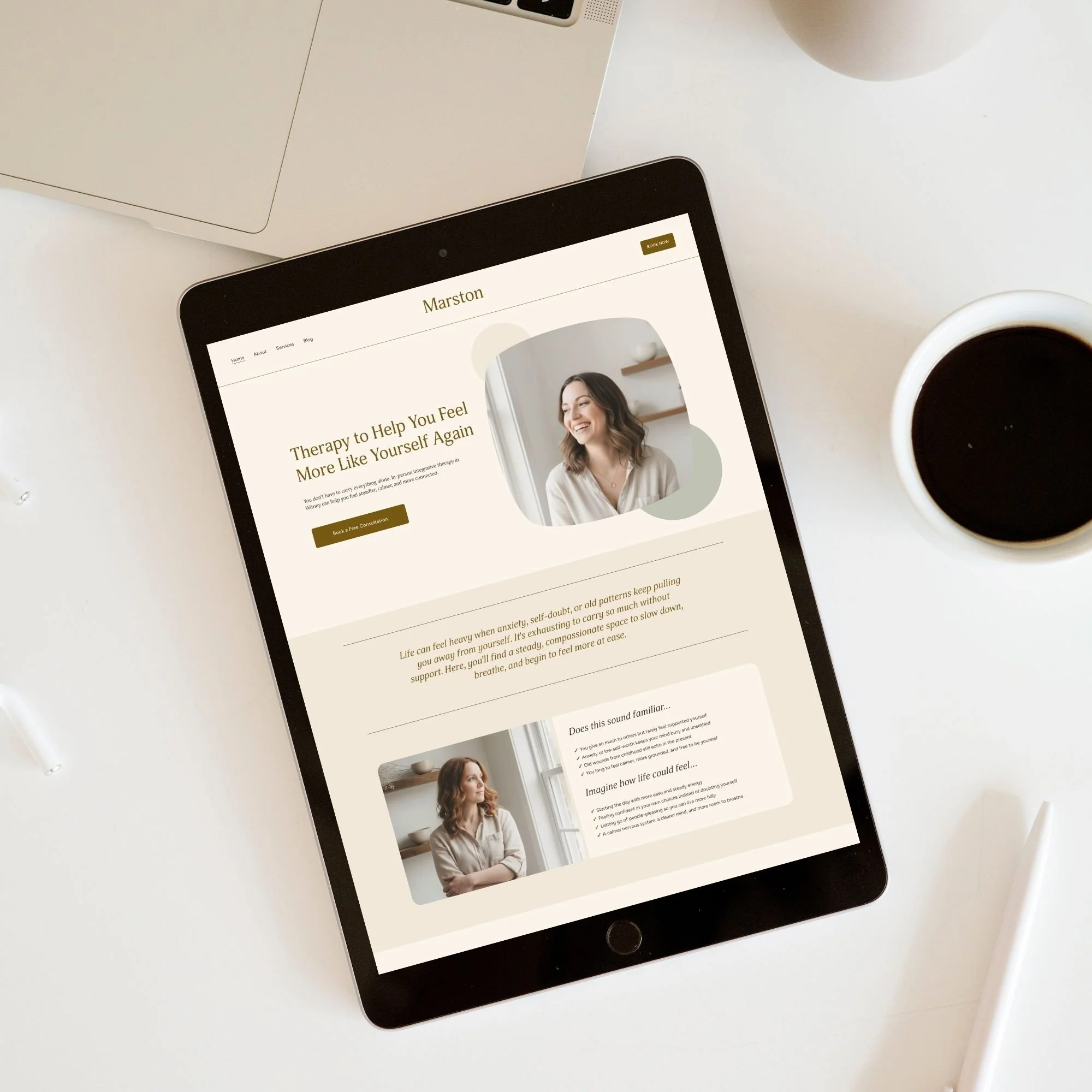 Tablet displaying Marston counselling website template for therapists and counsellors with a smiling woman, coffee cup, laptop, and white workspace.