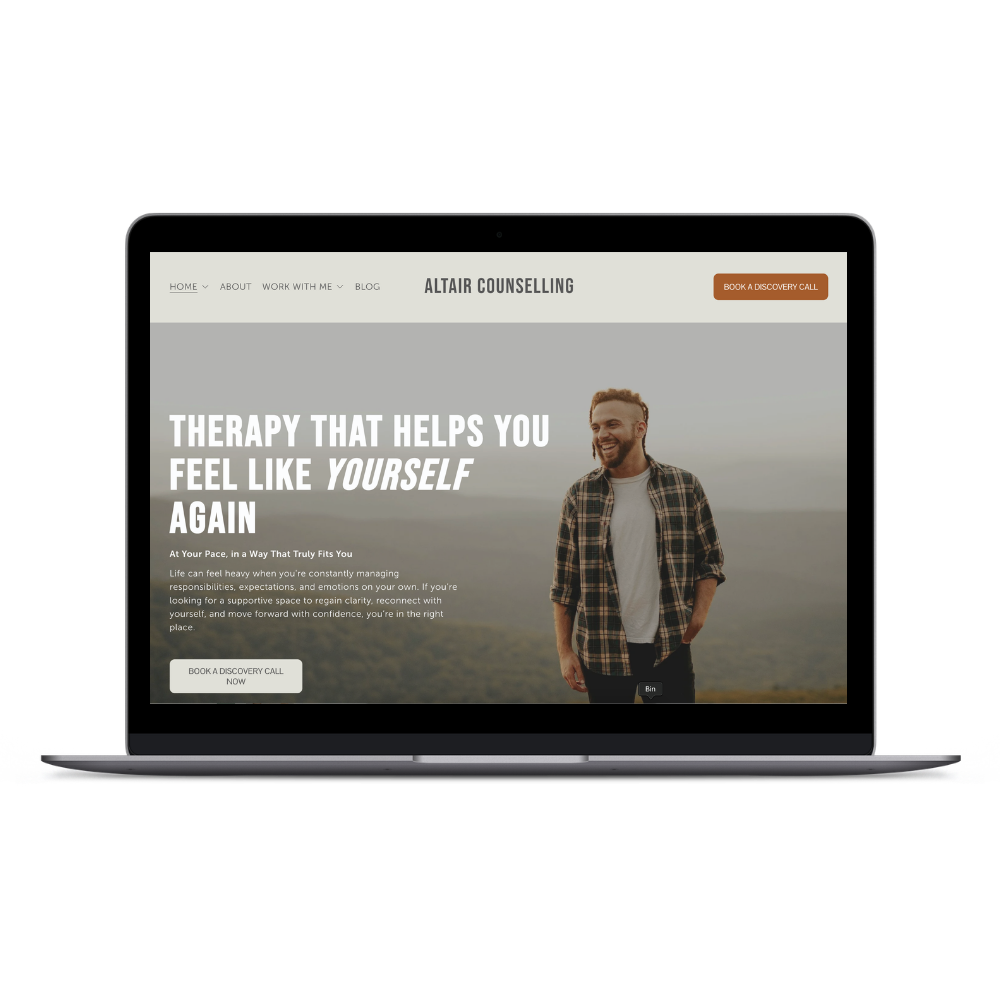 Laptop screen displaying a counseling website with a smiling man in a plaid shirt and a backdrop of outdoor scenery