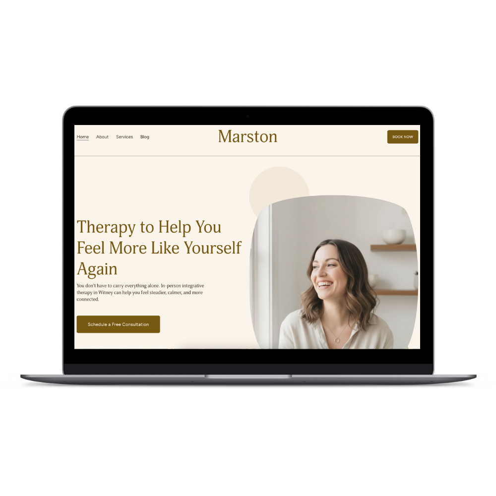 Laptop screen displaying a website for Marston therapy services, with a smiling woman on the right side and text about therapy benefits and scheduling a free consultation.