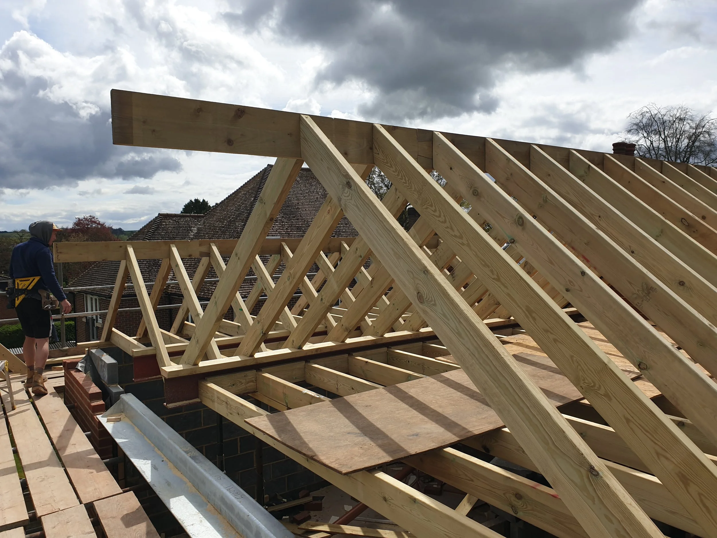 Two cut roofing connecting into a lead valley