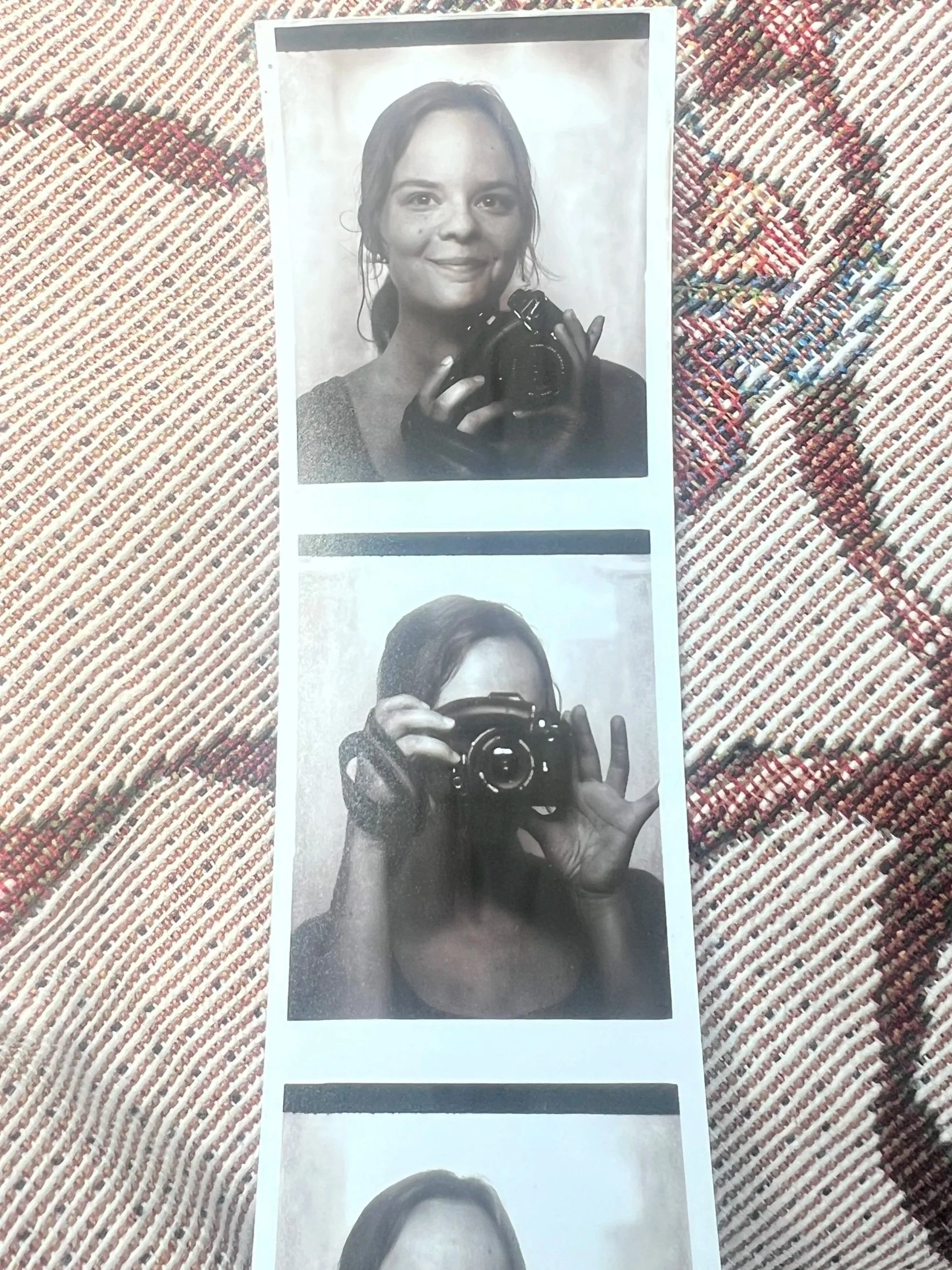 A black and white photo strip with three images of people taking self-portraits with cameras, arranged vertically on a patterned surface.