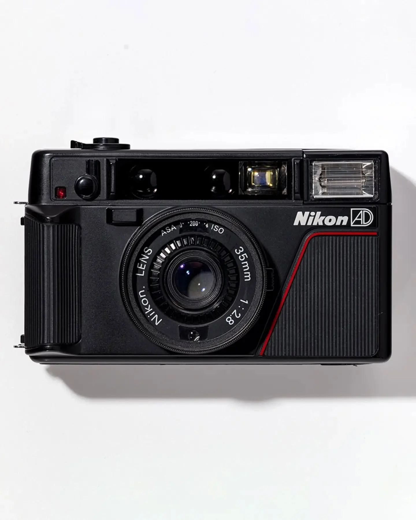 The 80's plastic fantastic cult camera Nikon L35AD 

20" x 30" print on high quality Hahnem&uuml;hle paper

Looking absolutely stunning printed at this scale seeing all the little details!