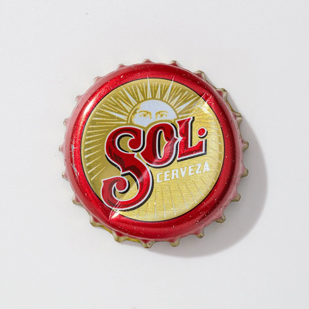 Sol bottle cap low res square crop.jpg