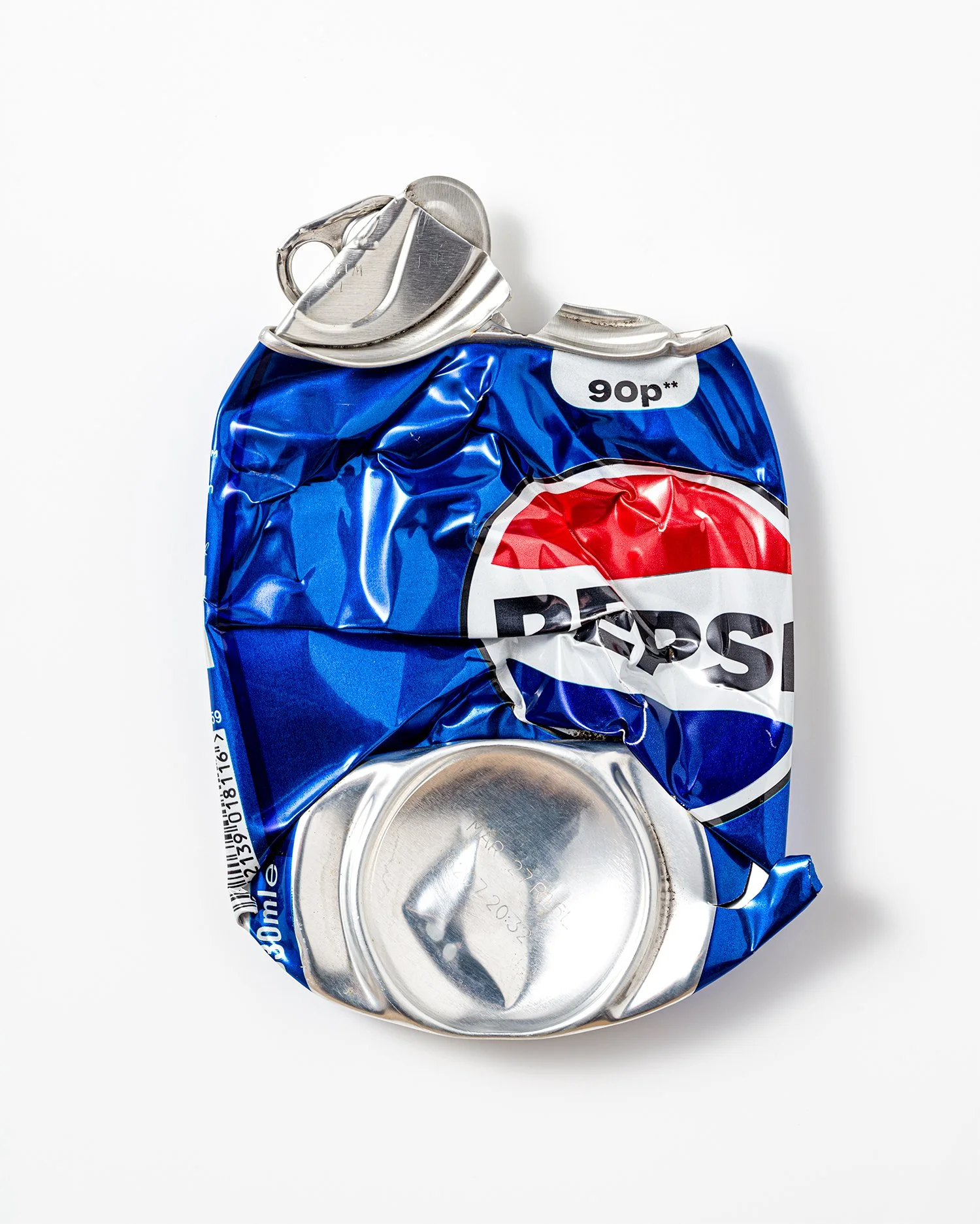 Crumpled blue aluminum soda can on a white background.