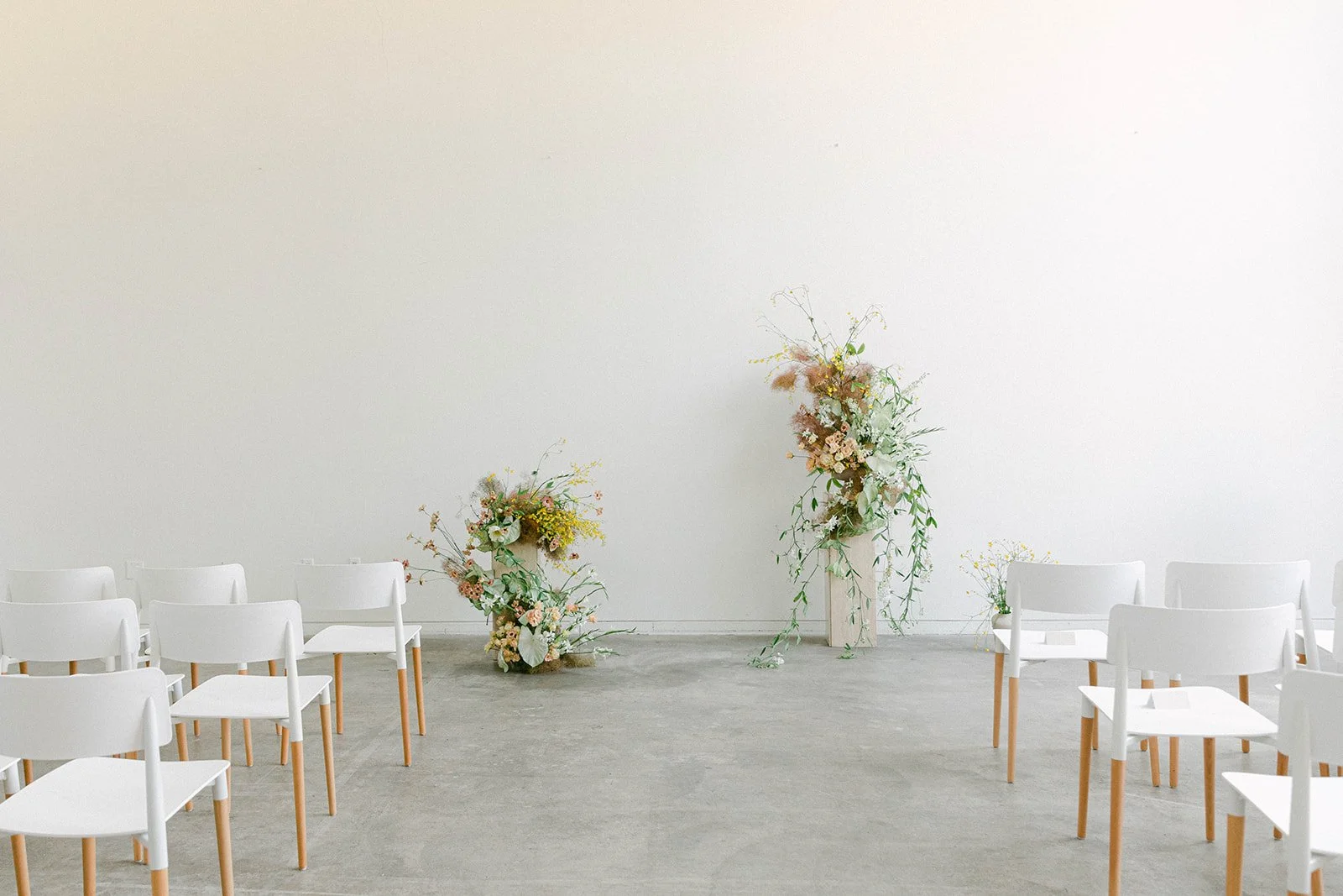 Florals for a wedding ceremony inside Toronto studio space and event venue 
