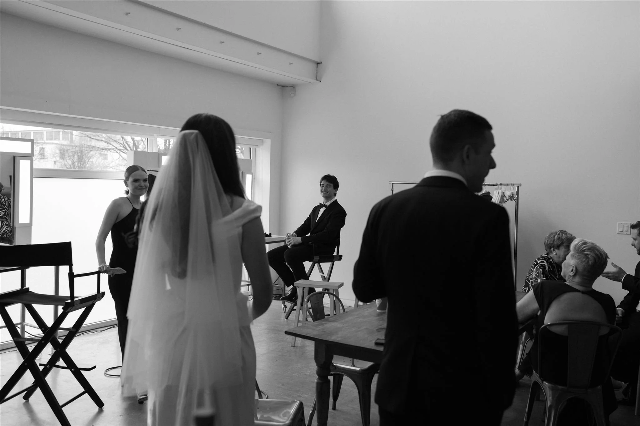 Bride spends time with wedding party in her bridal room inside Toronto event venue and studio rental space