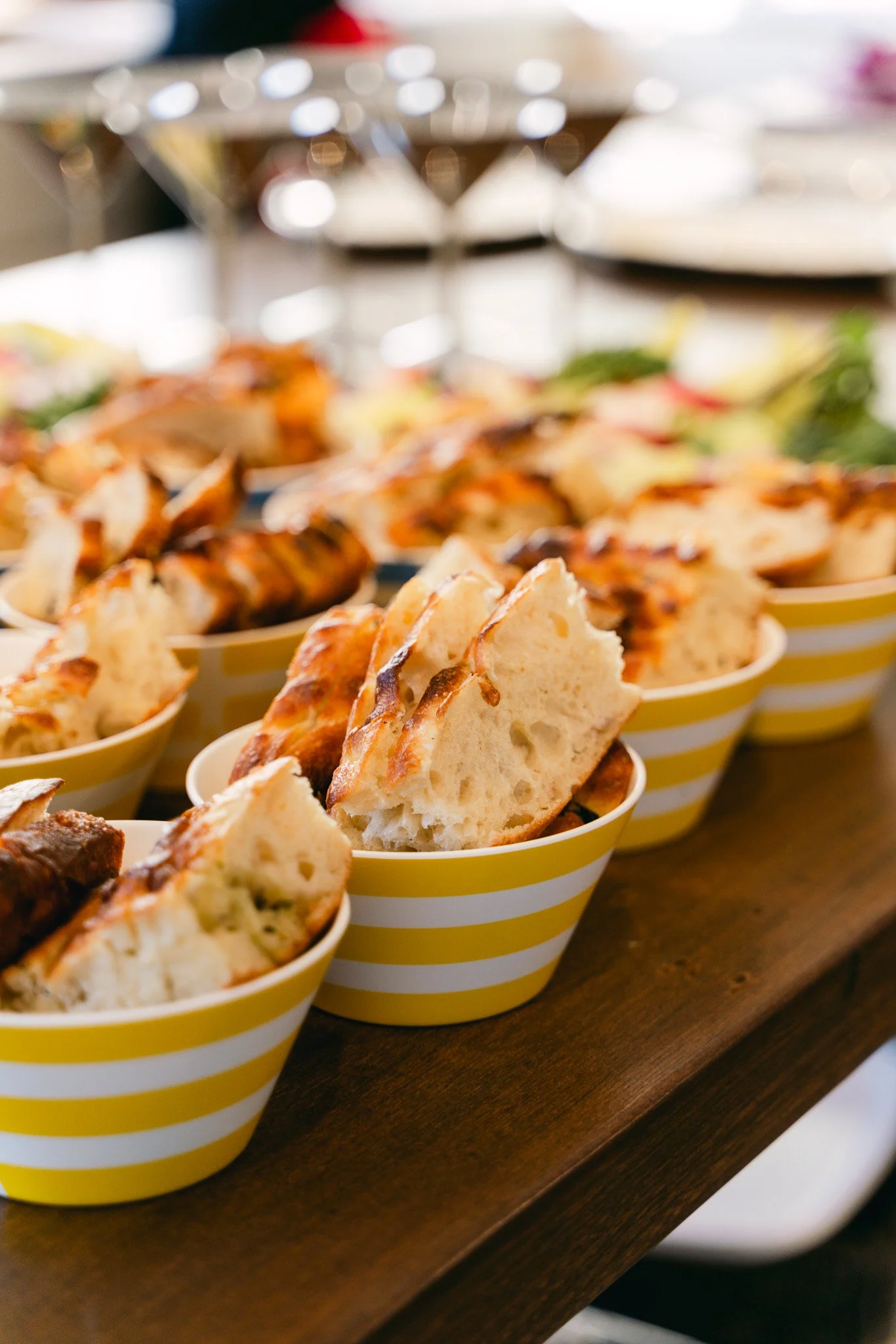  Close up of food on a wooden serving platter.