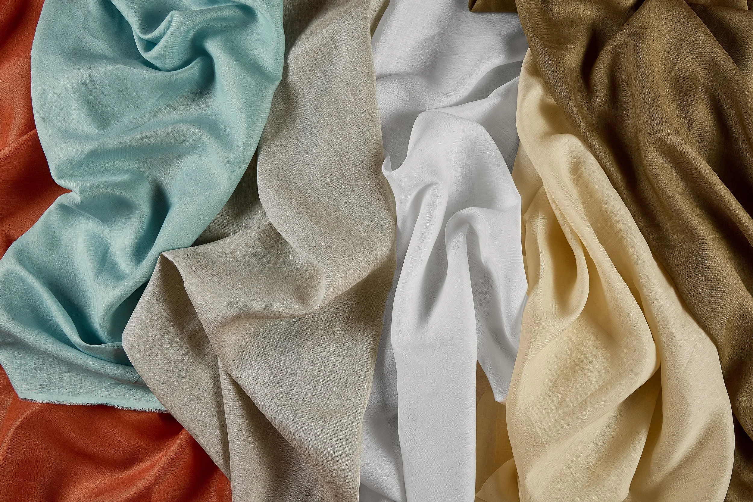 Wholesale high count premium pure linen fabric drape showing soft natural texture in Morandi and earthy tones