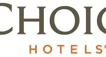 Part of a logo that says 'CHIO' with ‘HOTELS’ written underneath.