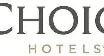 Part of a logo that says 'CHIO' with ‘HOTELS’ written underneath.
