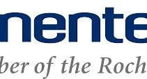 Partial view of a sign with blue and gray text, including the words 'rente' and 'umber of the Roch'.