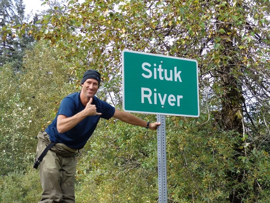Doug and Situk River Sign.JPG