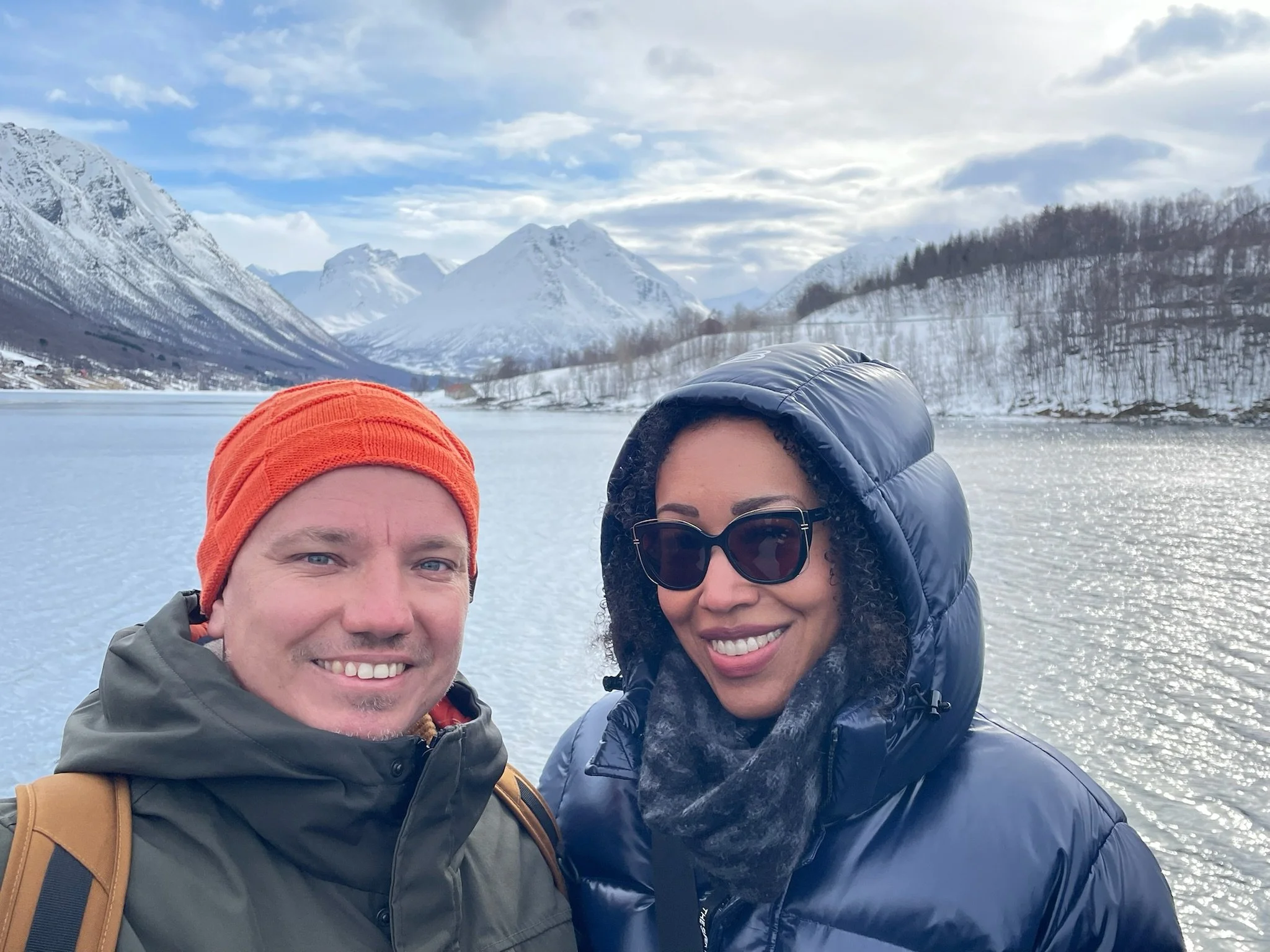 Maritza and Bjorn, Ringstad Sjohus, Vesteralen, Northern Norway property owners standing in front of a fjord.