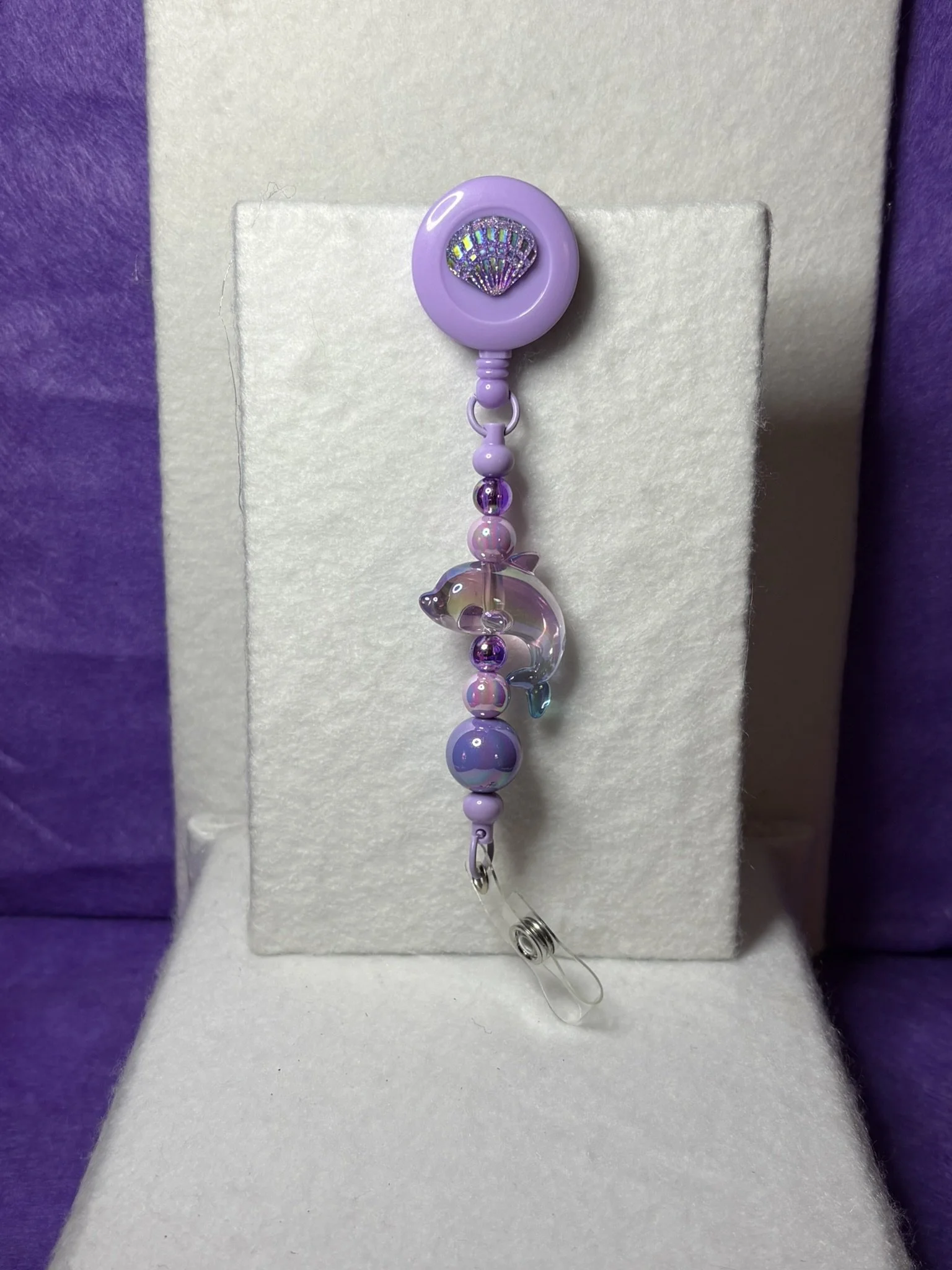 Vibrant Violet Dolphin Badge Reel