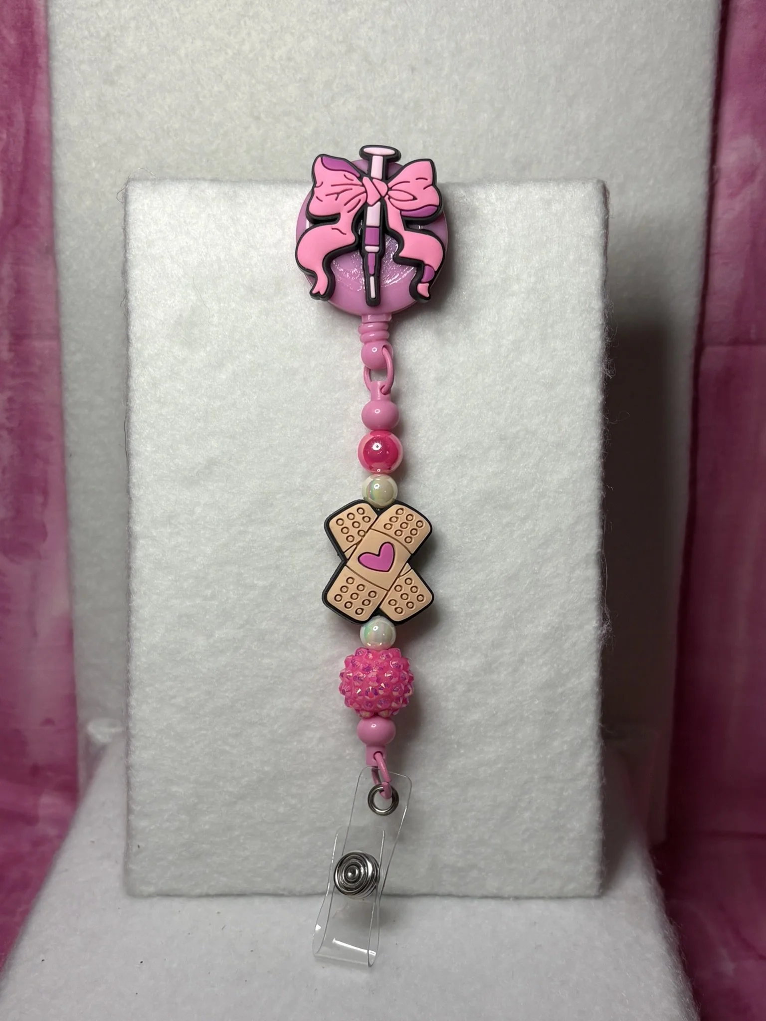 Healing Heart & Bow Badge Reel