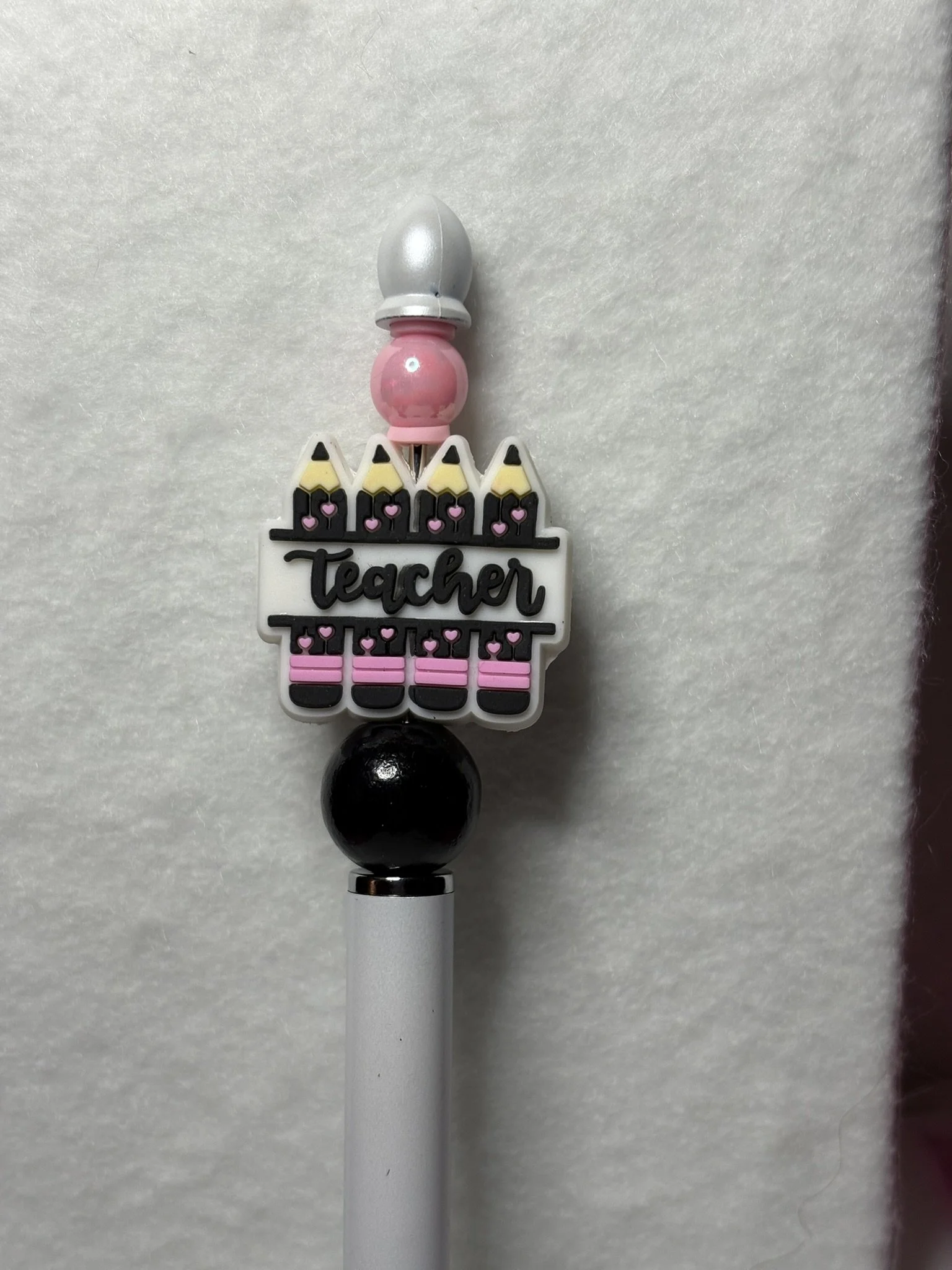 teacher white pen close.JPEG