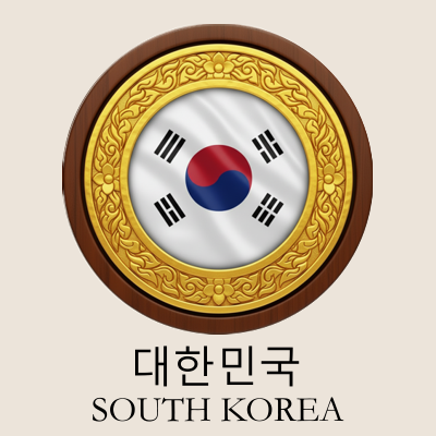 A circular emblem with a gold decorative border, featuring the South Korean flag in the center and the words South Korea in both Korean and English below.