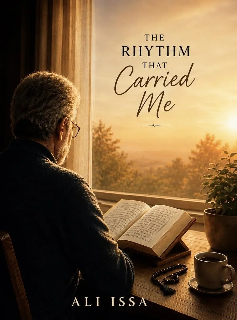 Cover of The Rhythm That Carried Me by Ali Issa, showing a quiet moment of reading beside a window at sunset, with coffee and prayer beads nearby, evoking the faith, memories, relationships, and rhythms that quietly carry us through life.