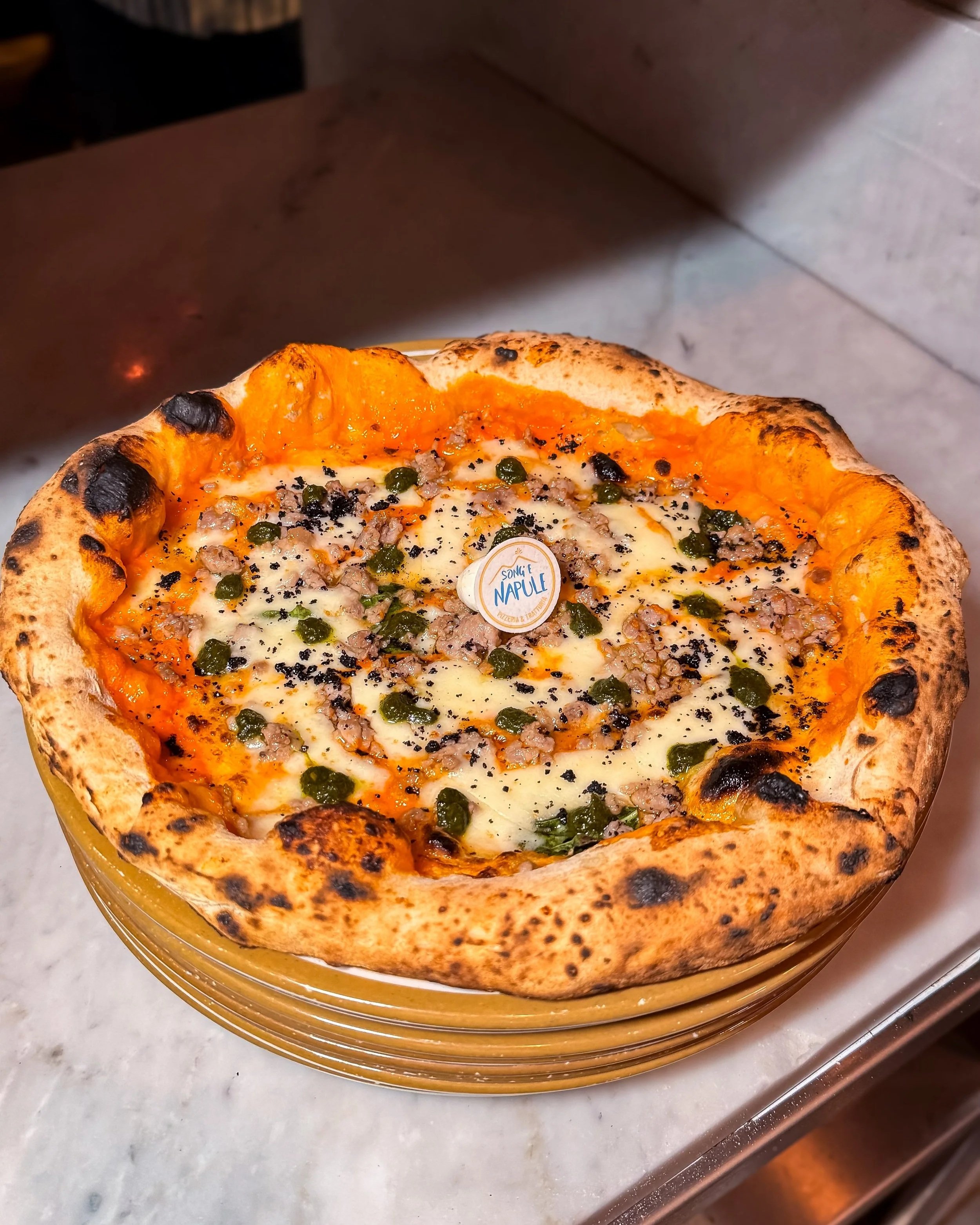 Special pizza served in a plate at our Upper West Location