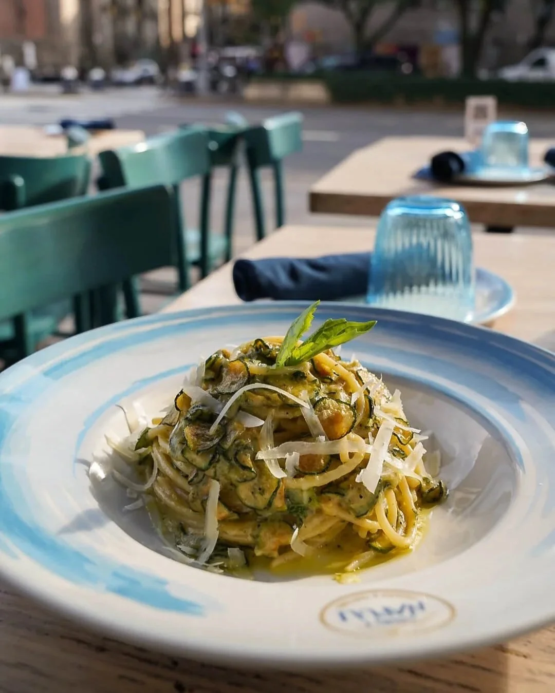 Pasta dish in a table outdoor West Village