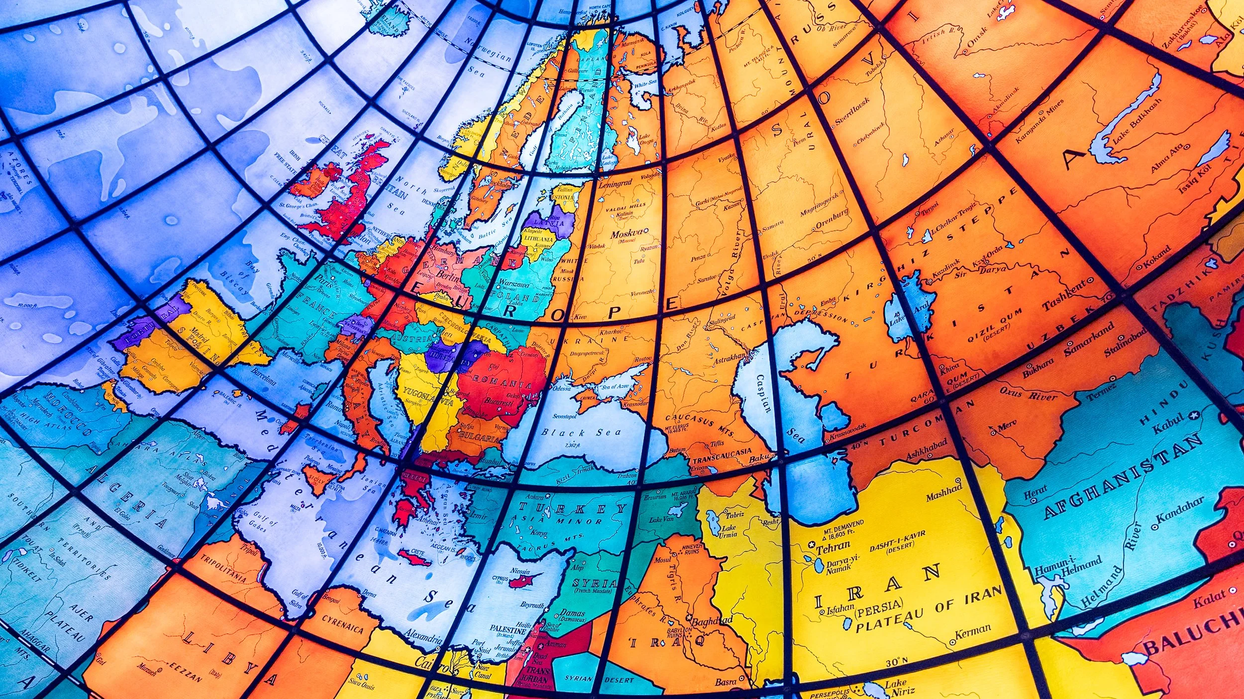 Europe and the Middle East curve across this section of Boston’s Mapparium globe, with countries, territories and mandates labeled as they were in 1935. Much has changed in ninety-one years. Not one of these stained-glass panels has.