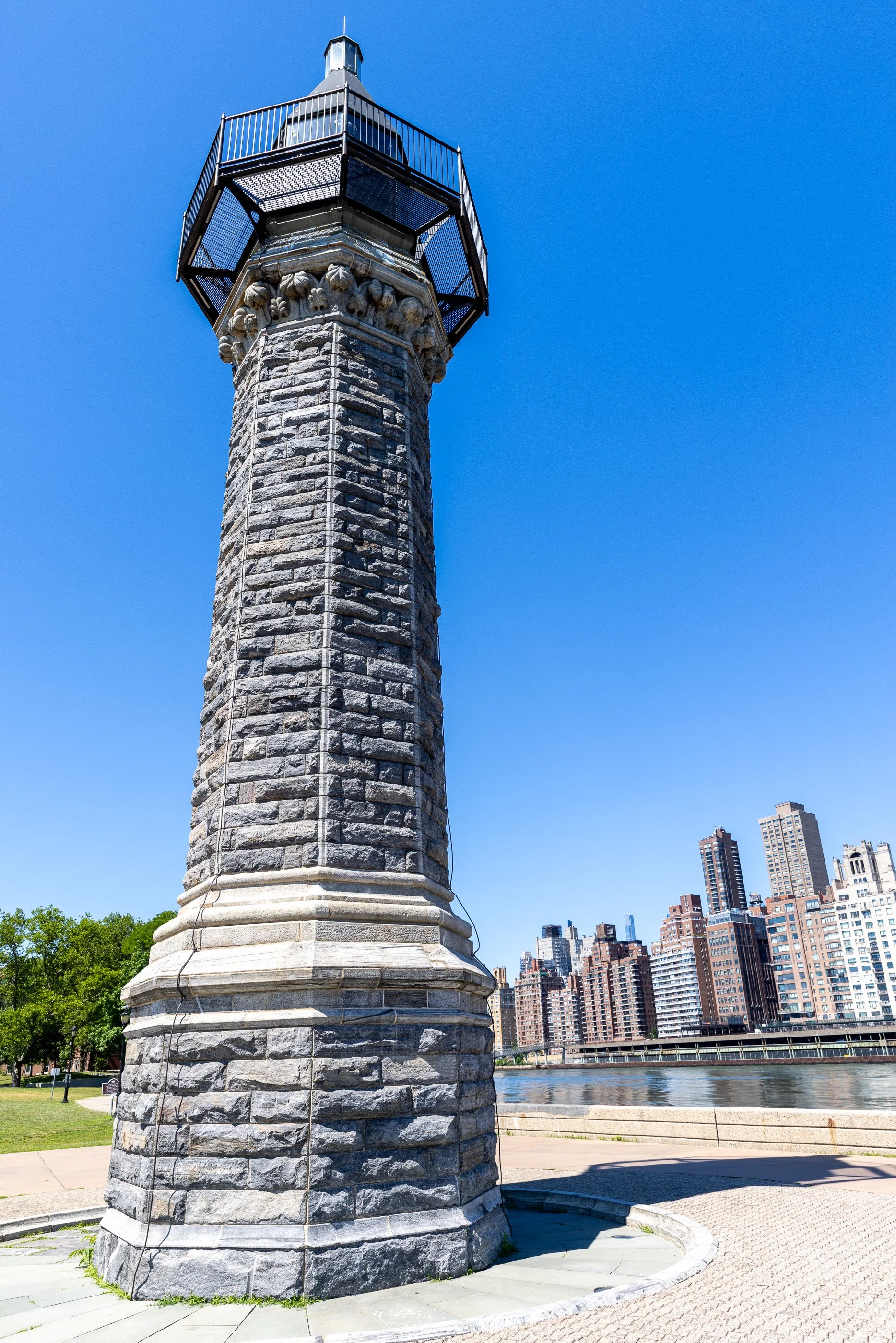 The lighthouse has stood at the island’s northern tip since 1872. Built from gray gneiss quarried on the island, it survives from the Blackwell’s Island years, when this end of the island was dominated by city institutions.