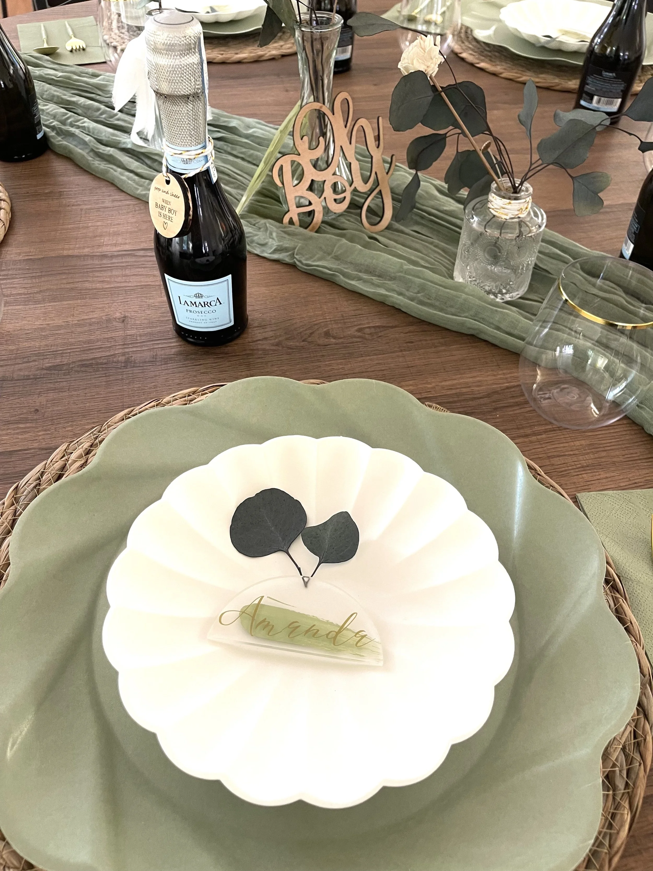 Sage green and gold baby shower place setting styled by Wildly Pretty Events