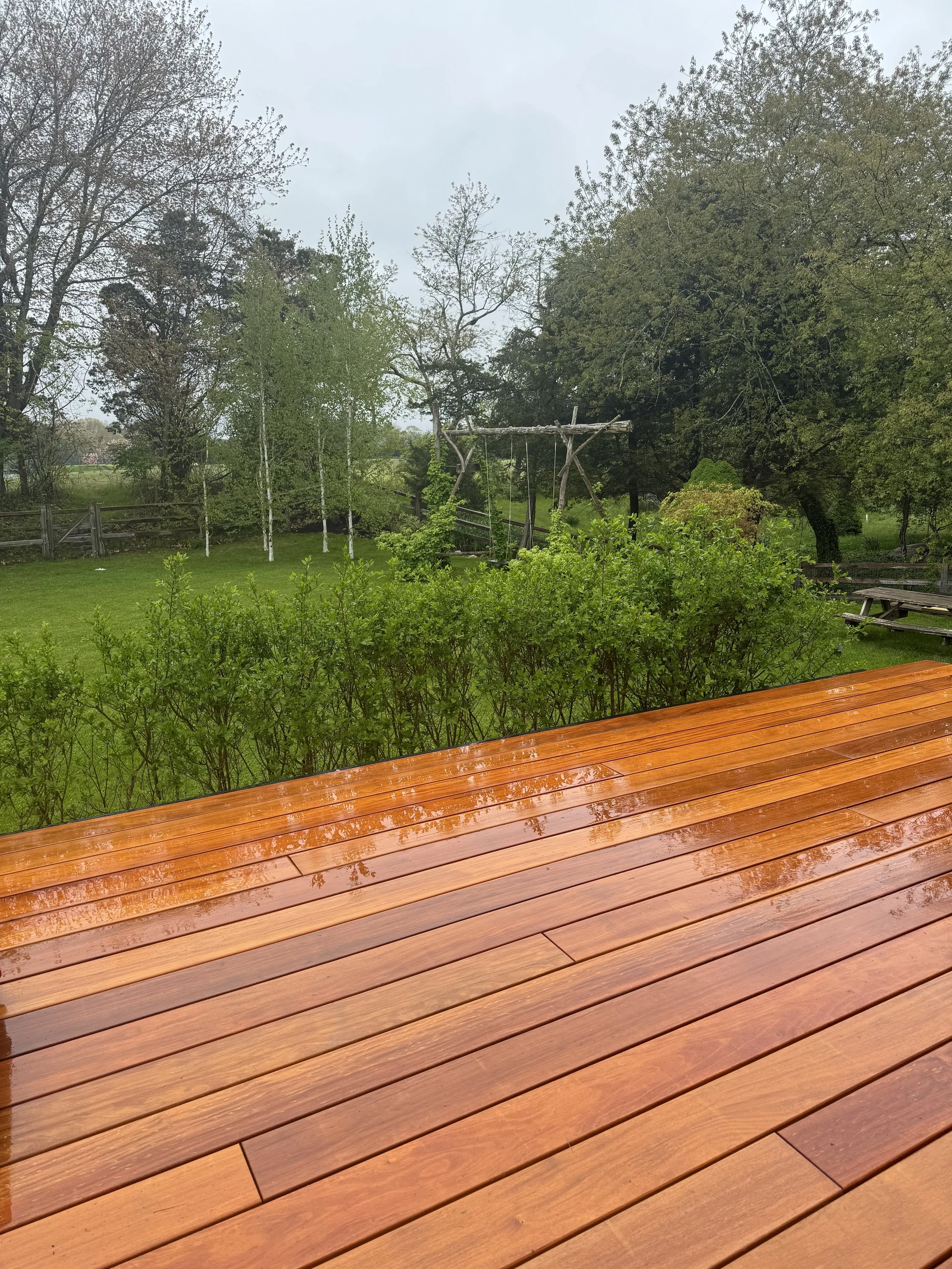 Garapa exotic hardwood random stagger deck boards with hidden clips in Watch Hill RI
