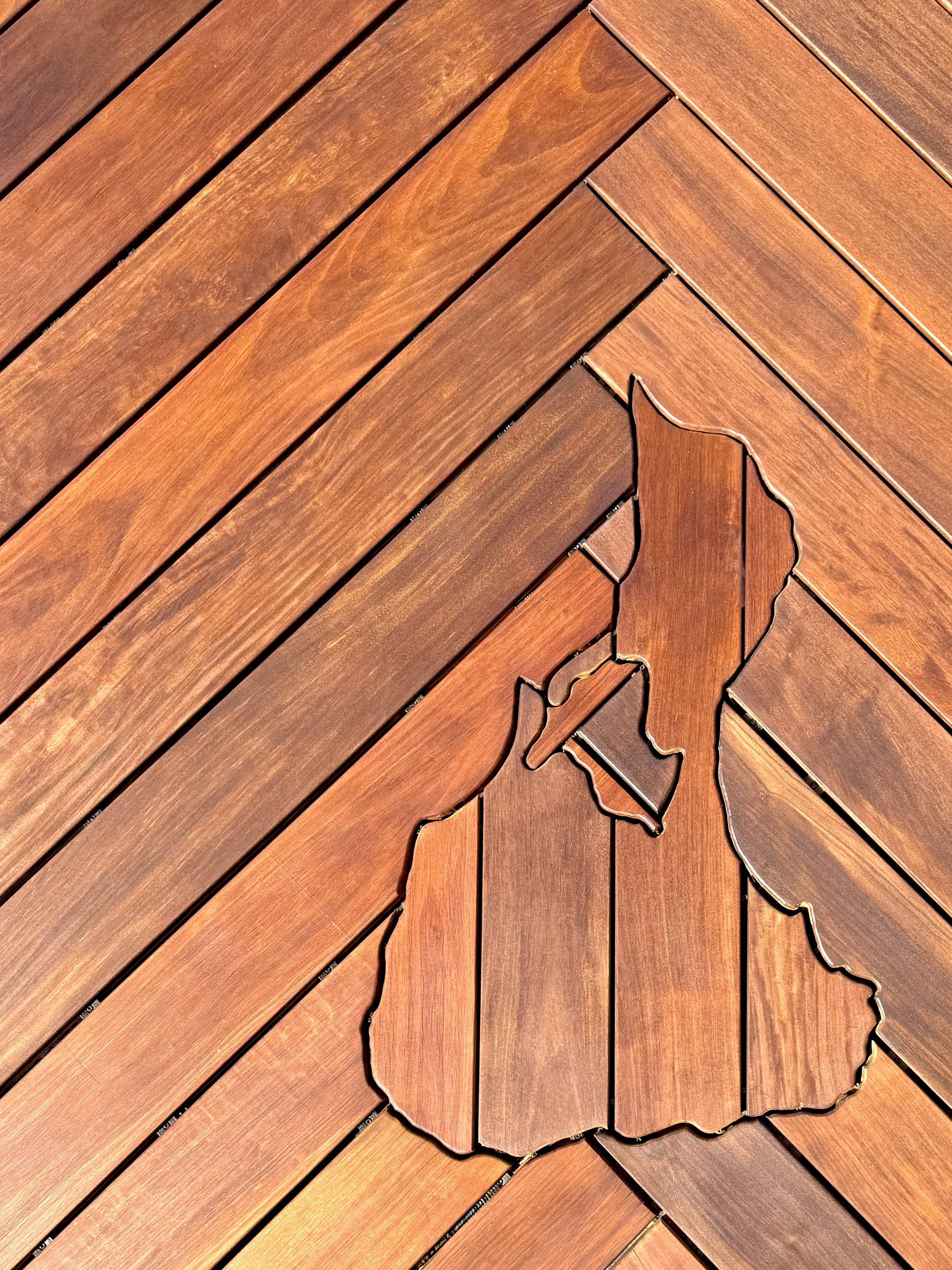 Ipe herringbone deck with custom block island inlay secured with camo edge clips in Rhode Island