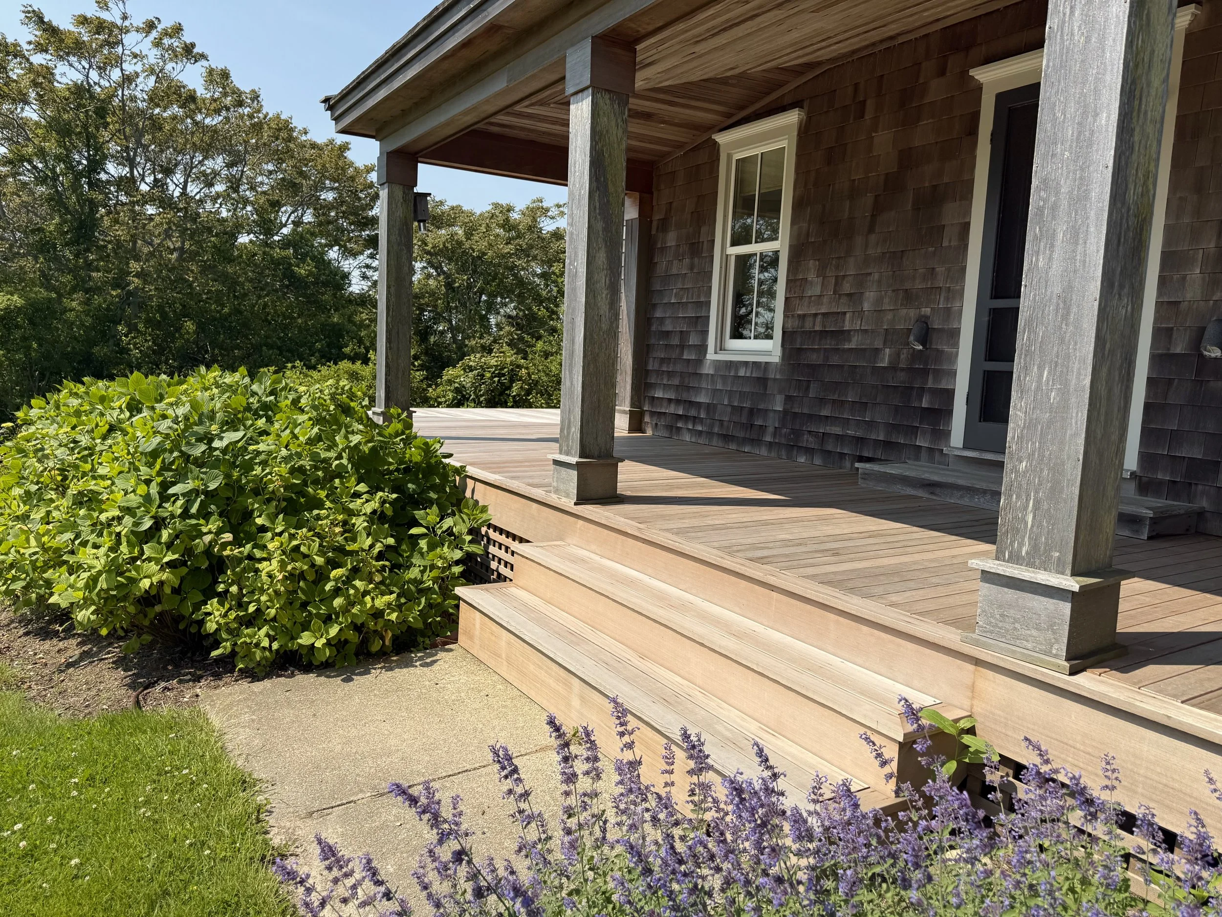 Block Island home on corn neck road with custom western red cedar deck boards, trim, and stairs