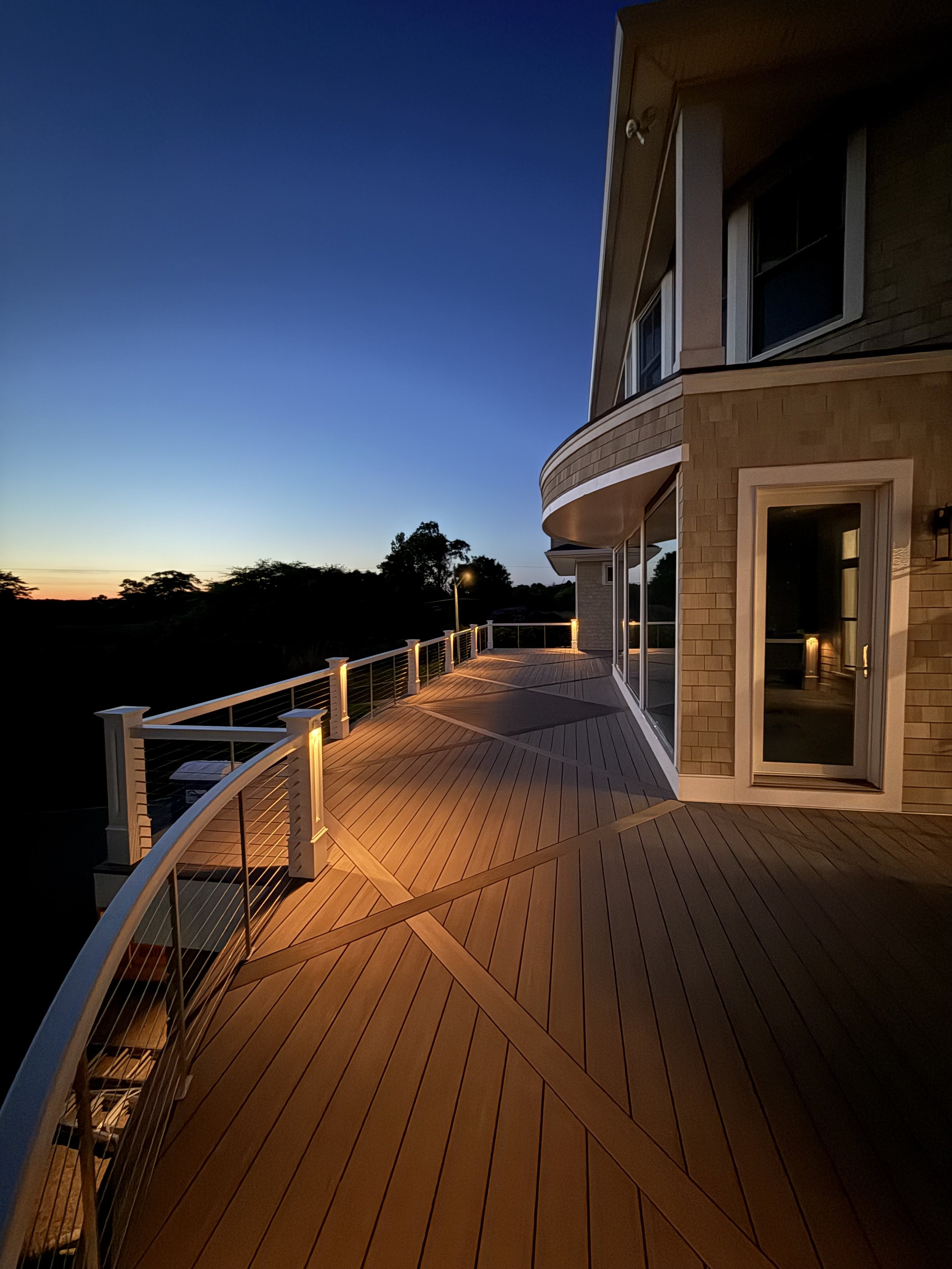 Custom diagonal breaker board deck with Timber Tech Coastline Vintage Collection boards with Camo Edge Clips in Watch Hill Rhode Island
