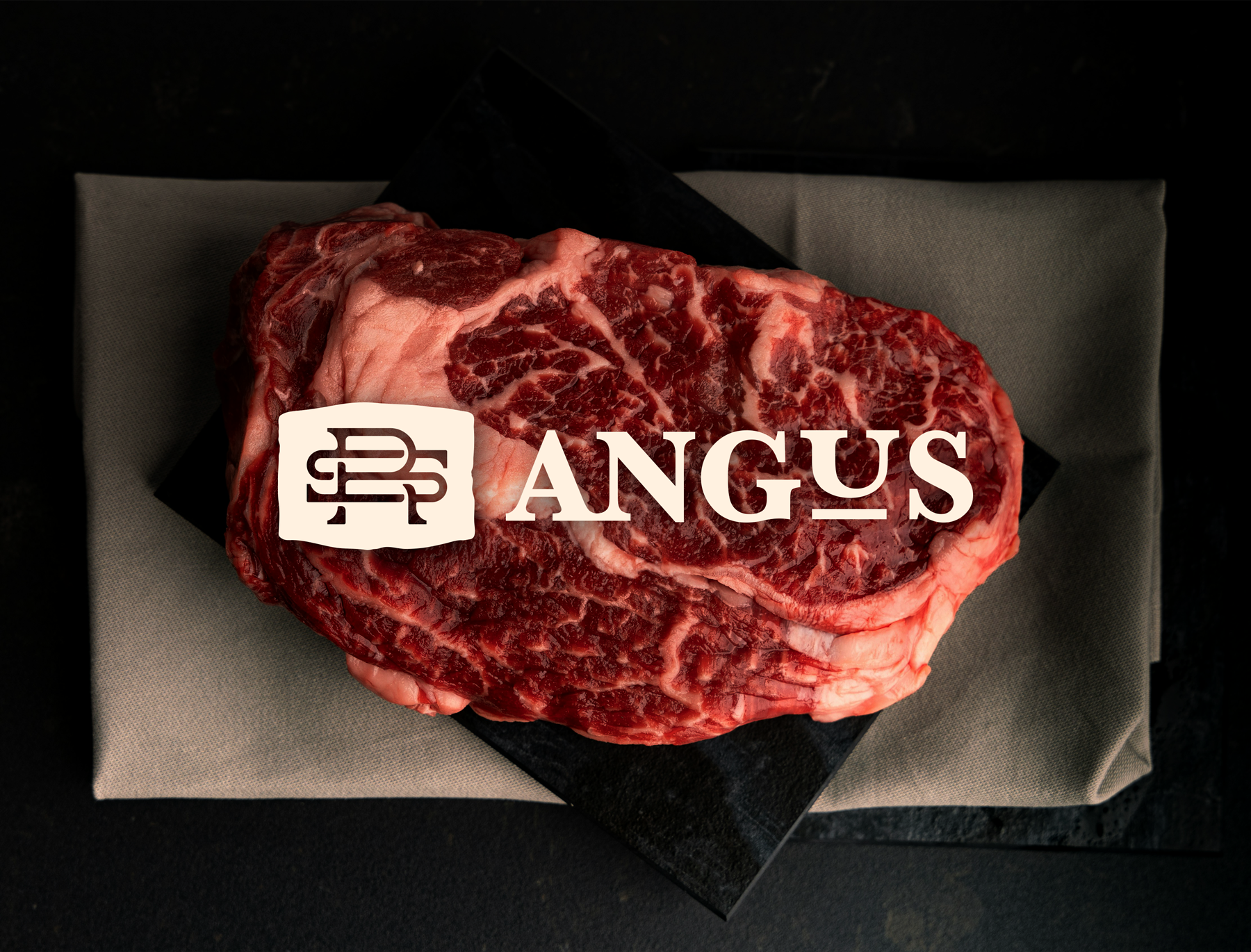 SR Angus logo placed over high resolution image of quality angus beef being prepared