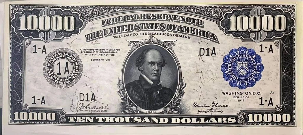 A vintage 1918 ten thousand dollar U.S. banknote featuring President Abraham Lincoln in the center.