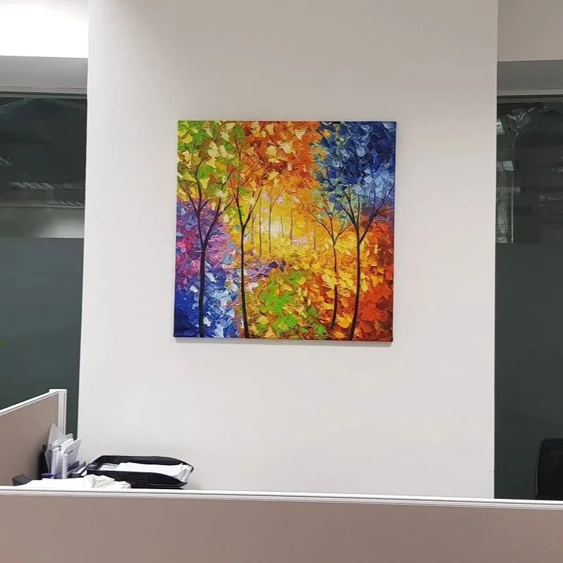 Colorful painting of trees in an autumn forest with vibrant leaves in yellow, orange, red, purple, and blue hues.