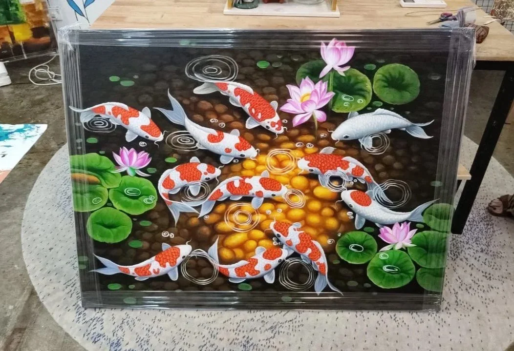 3D painting of koi fish swimming among lily pads and pink water lilies on a pond surface.