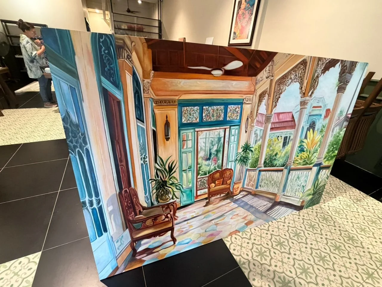 A painted folding screen depicting a bright, colorful porch with ornate columns, benches, potted plants, and large windows with stained glass, set in a lush garden scene.