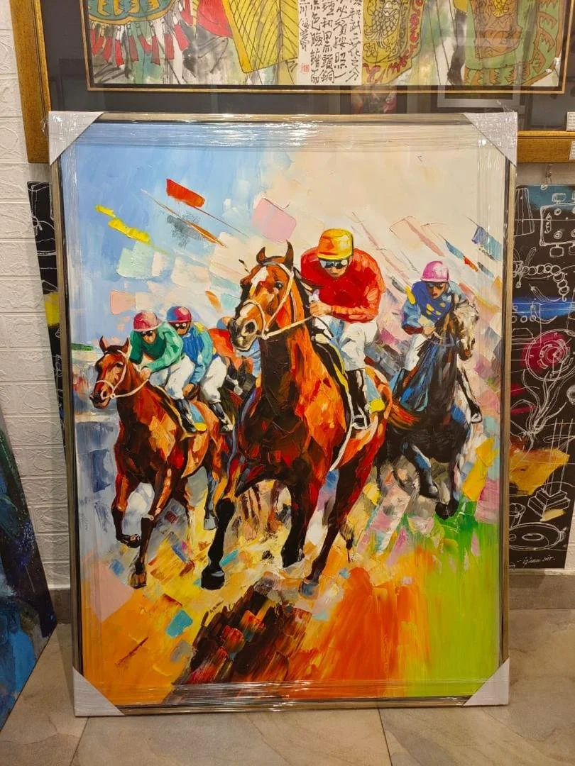 Colorful painting of racehorses and jockeys running on a racetrack.