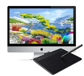 Digital drawing of a coastal landscape with trees, mountains, flowers, and blue water on an iMac screen, with a graphics tablet and stylus in front.