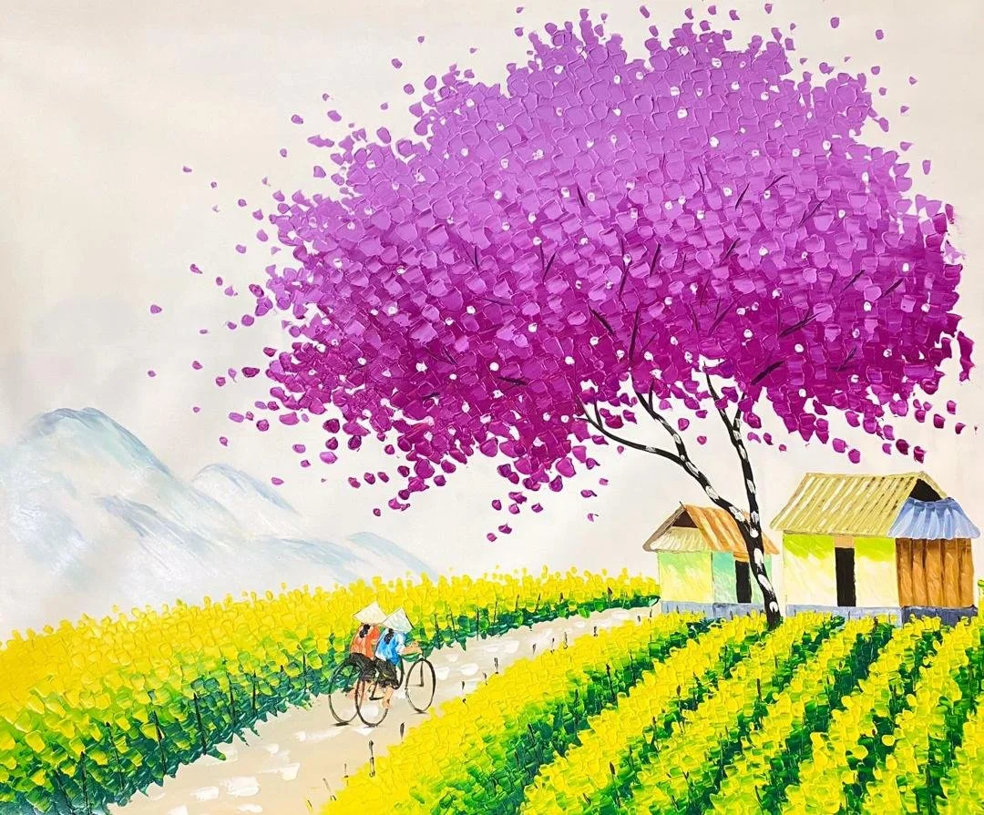 A colorful painting of a rural scene with a large purple flowering tree, yellow fields, two small houses with different colored roofs, and two people riding bicycles on a path. Mountains are in the background.