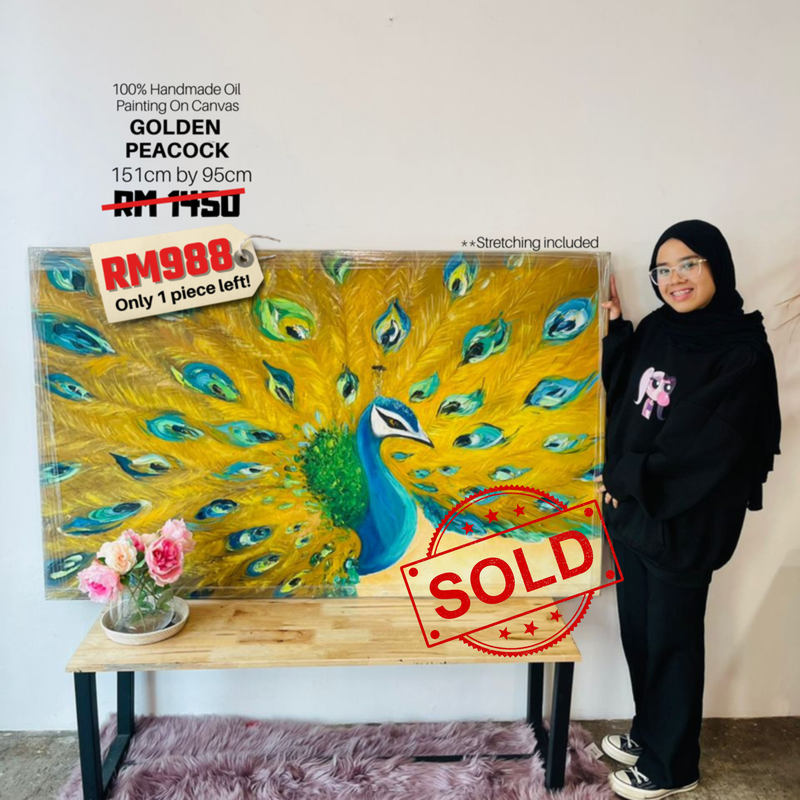 A woman standing next to a large, colorful peacock oil painting on canvas, with a price tag showing RM 988 and a "sold" stamp. The painting depicts a peacock with vibrant feathers.