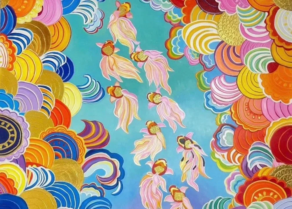 Colorful mural featuring multiple goldfish swimming in a blue sky, surrounded by vibrant abstract patterns and clouds.