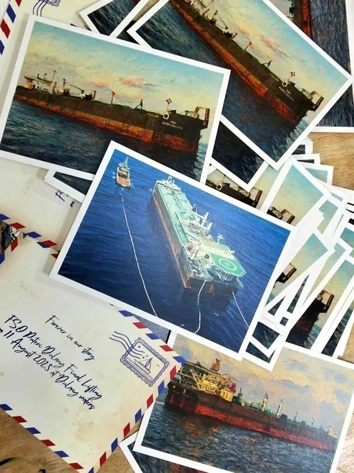 Collection of printed photographs of ships and a handwritten letter on an airmail envelope.