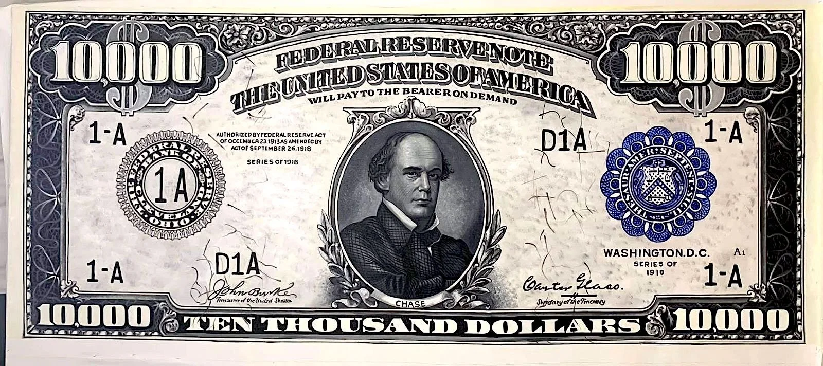 Historic $10,000 bill with portrait of Abraham Lincoln in the center, decorative borders, and denomination markings, issued by the United States in 1918.